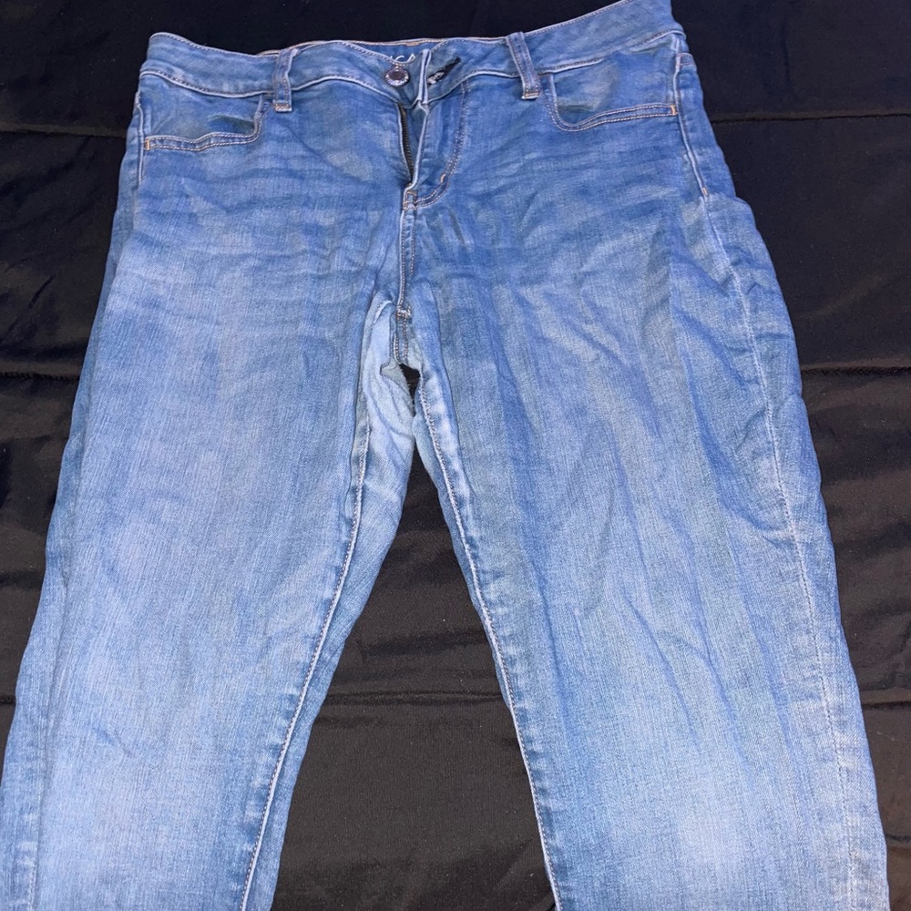 Blue american eagle jeans.
